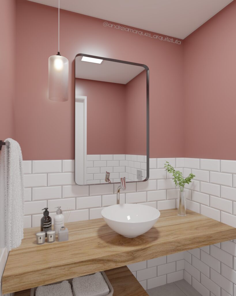 Lavabo clean e minimalista com paredes em rosa queimado, revestimento branco tipo subway tile e bancada de madeira com cuba de apoio.